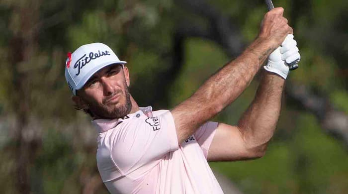 Max Homa is pictured hitting from the fairway at the 2024 Sentry Tournament of Champions at Kapalua's Plantation Course.